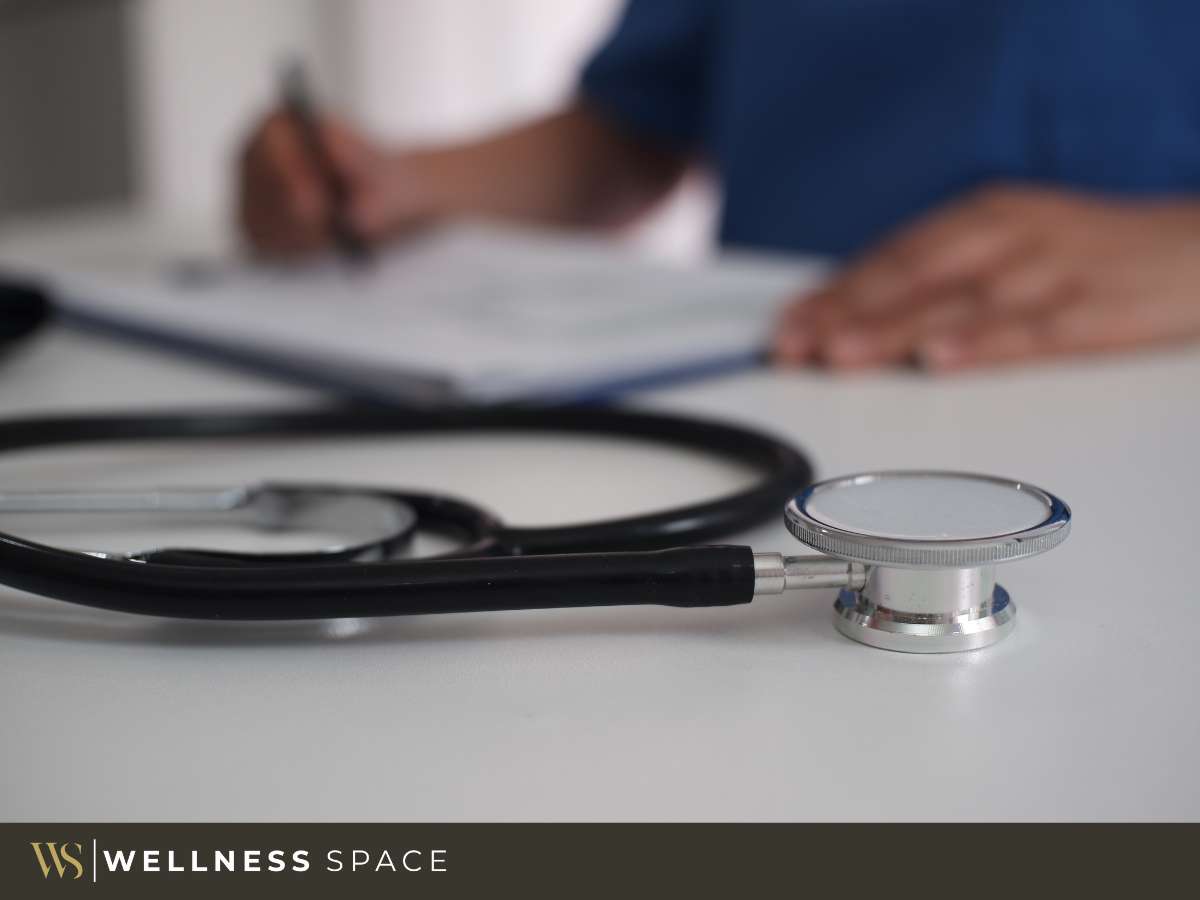 Medical Coworking space with a stethoscope and doctor writing notes